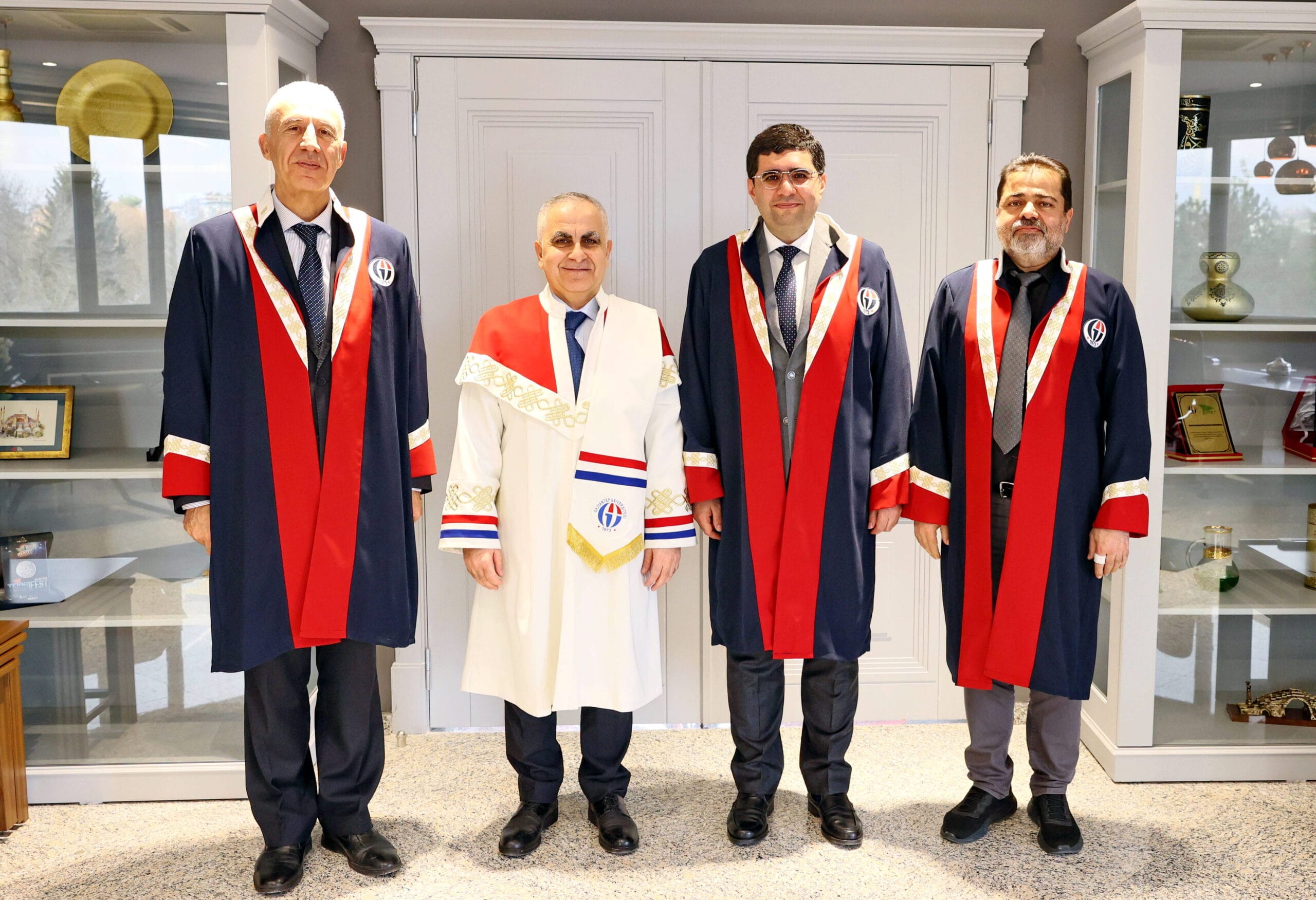GAÜN’DE AHMET ULUŞAN’A PROFESÖRLÜK ROZETİ TAKDİM EDİLDİ